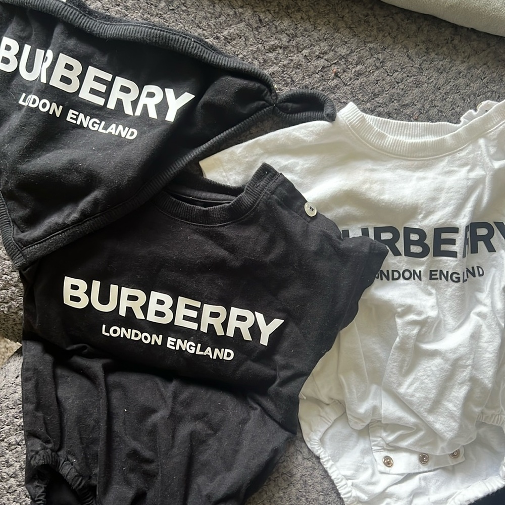 6 Months Burberry onesie w/ one bib.